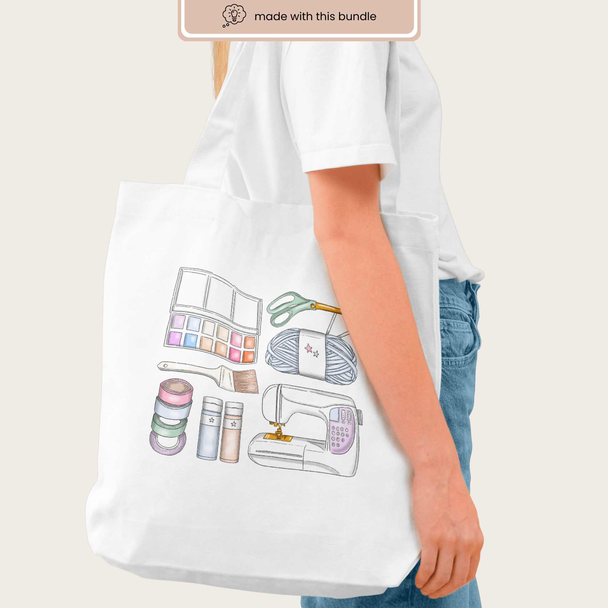 Canvas tote bag mockup displaying the illustrated crafting supplies as a colorful central design.