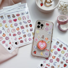 Load image into Gallery viewer, phone case sticker pack with cute hand drawn illustrations like smiley face donut cherries lips stars flowers shell peach and more